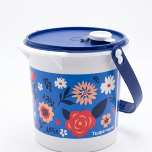 Recipiente Tupperware blanco con estampado floral azul, tapa azul y asa lateral